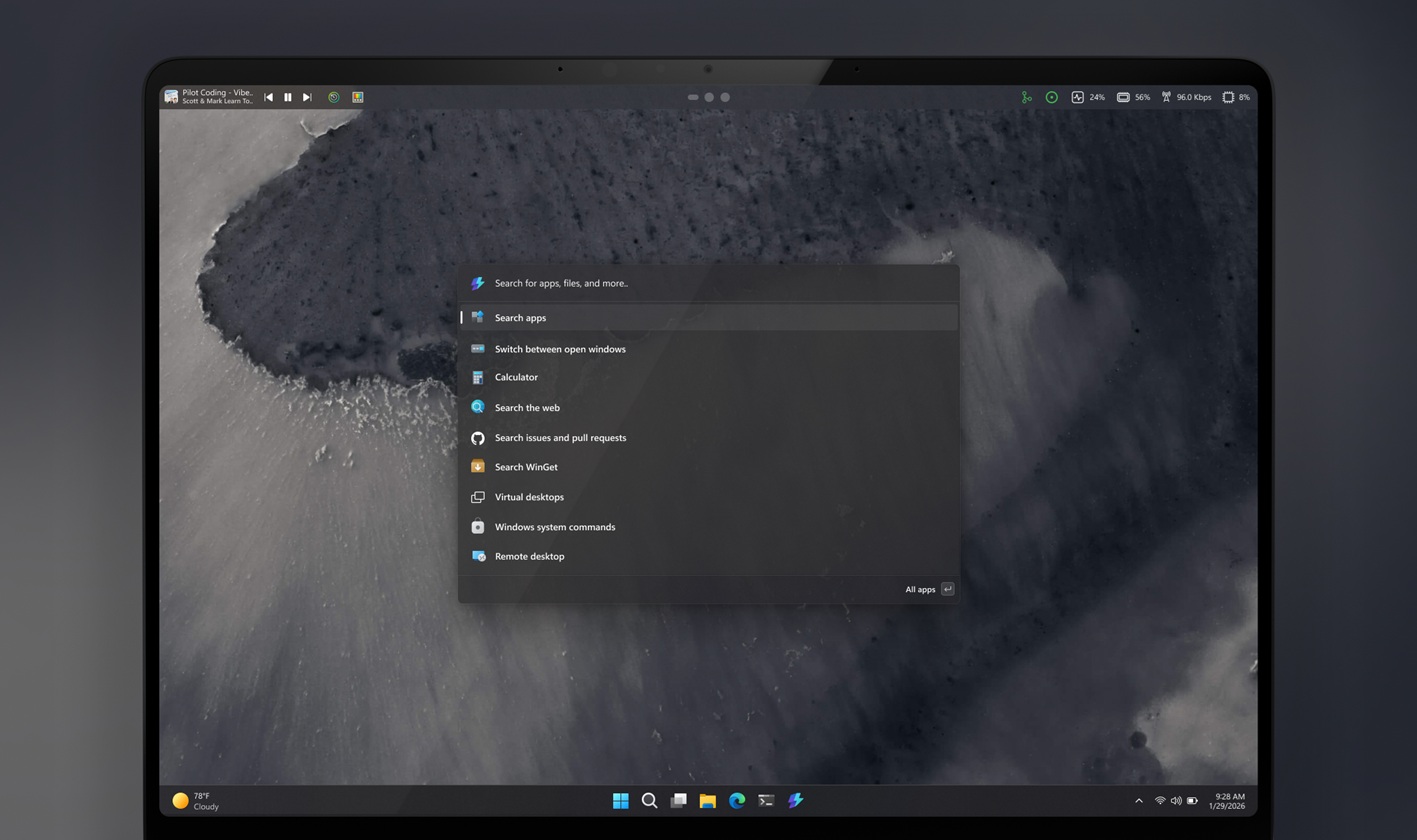 Windows 11 is testing an optional Dock that sits on the top of the screen with music playback control, CPU, GPU, RAM stats, and more